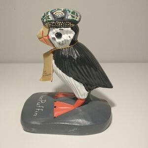  a hand-painted, Ceramic MacPuffin figurine from Cape Breton, Nova Scotia. 